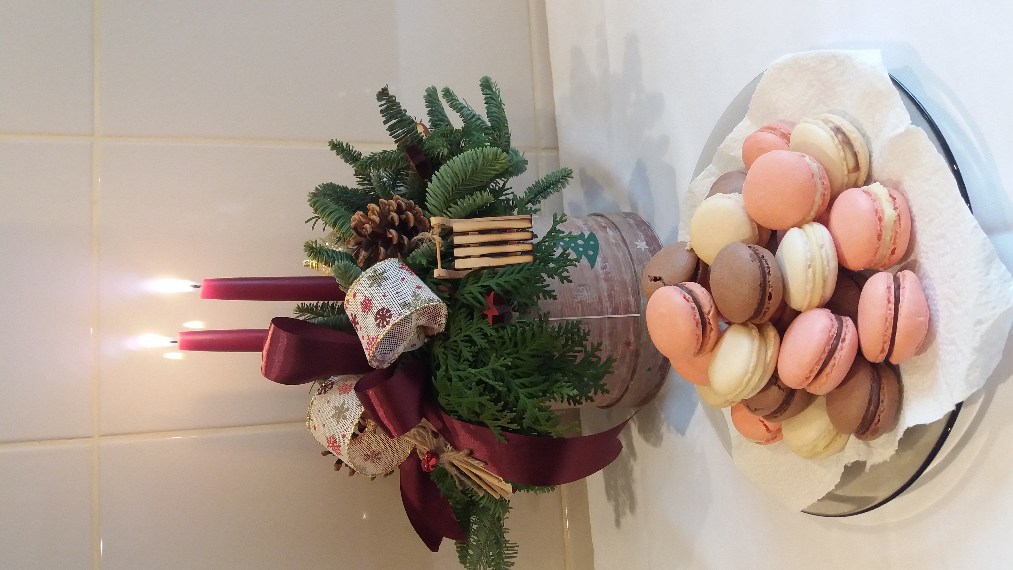 Macarons and candles on a table