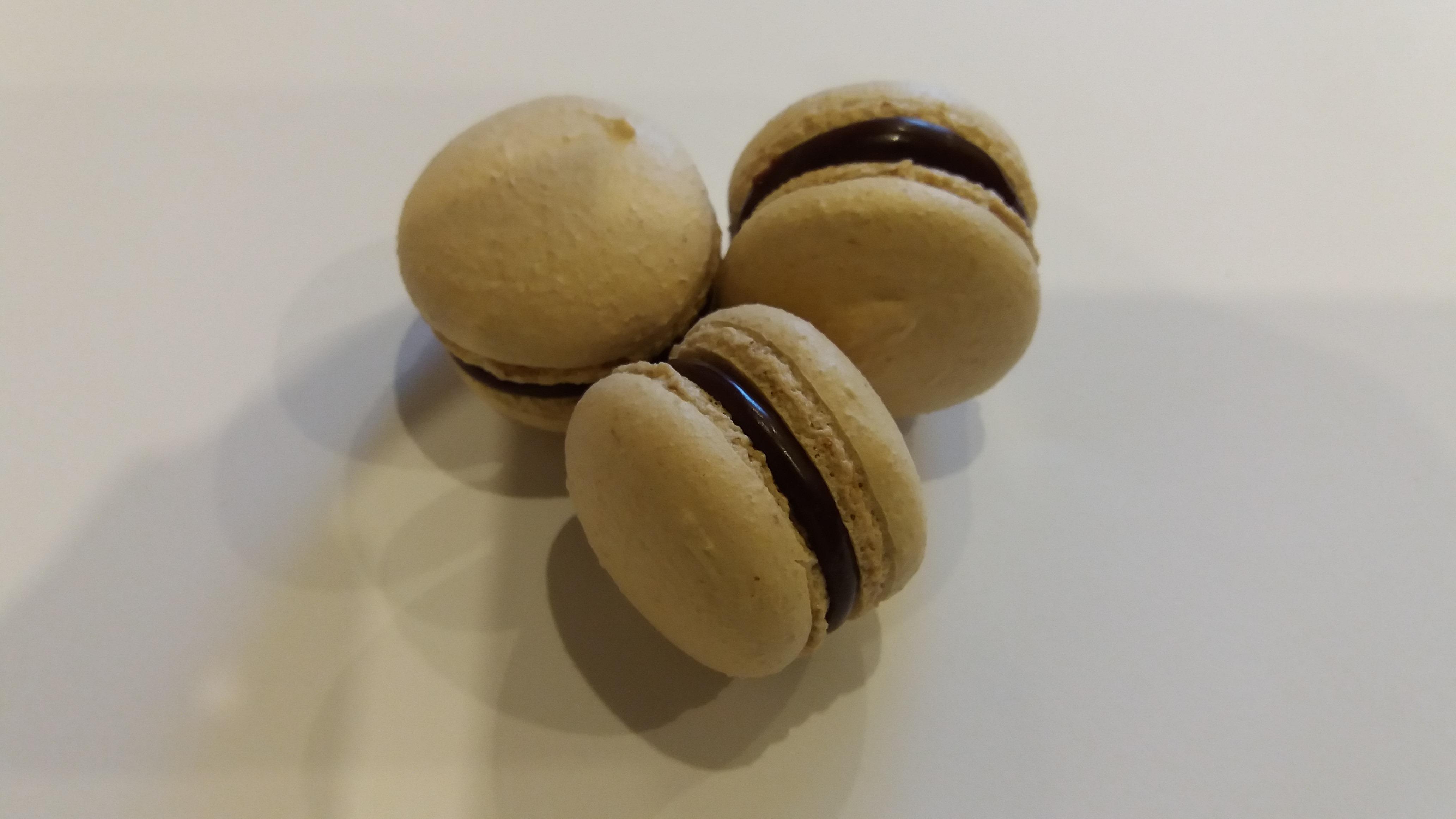 Three coffee macarons