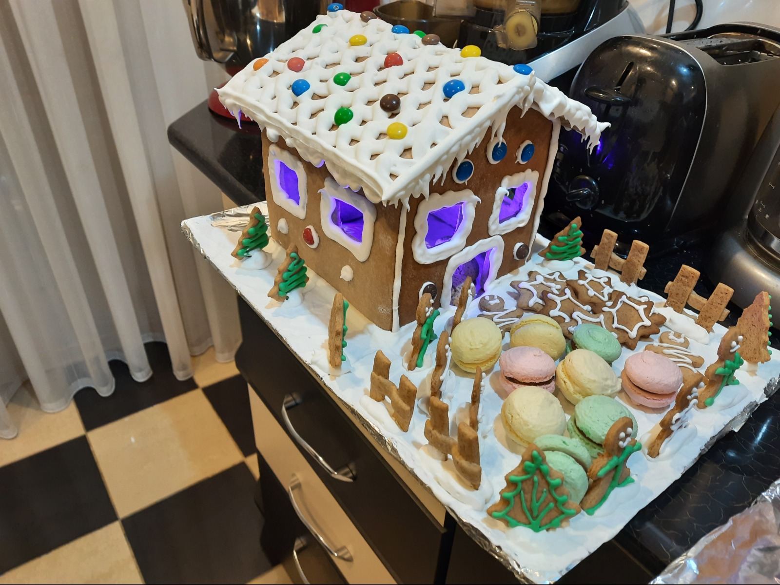 Gingerbread house with macarons