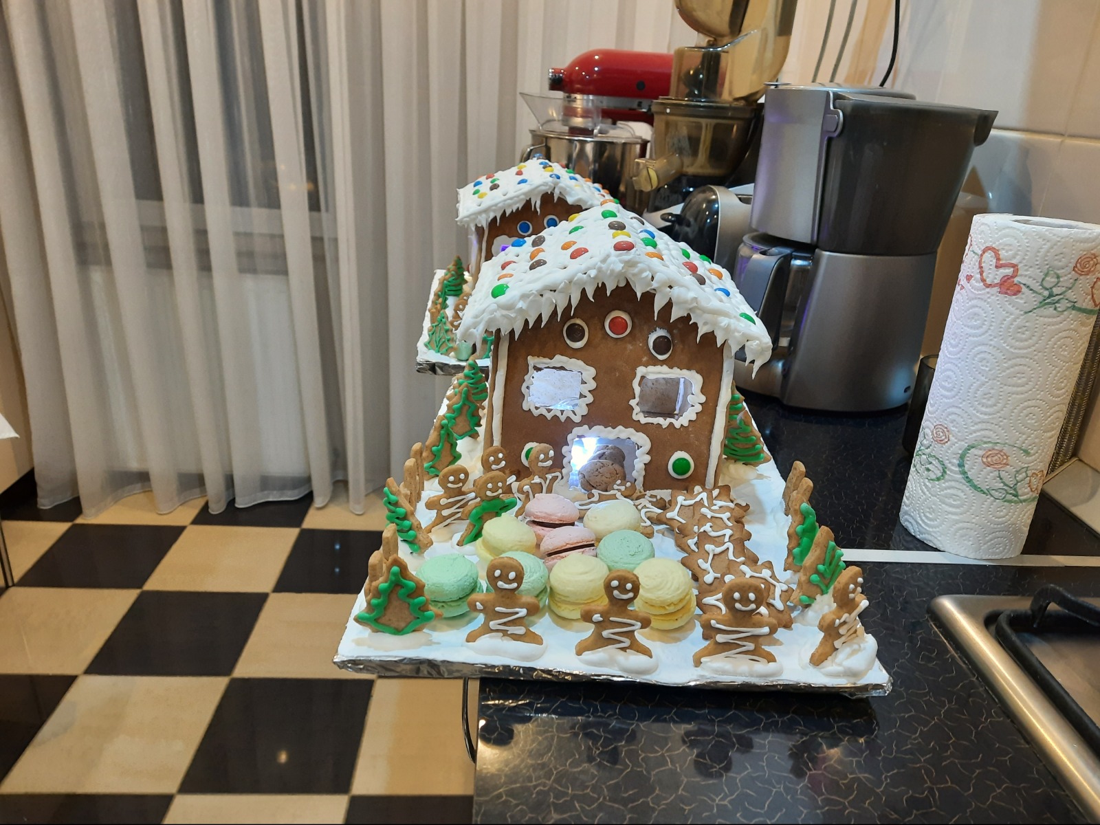 Gingerbread house with macarons in the courtyard